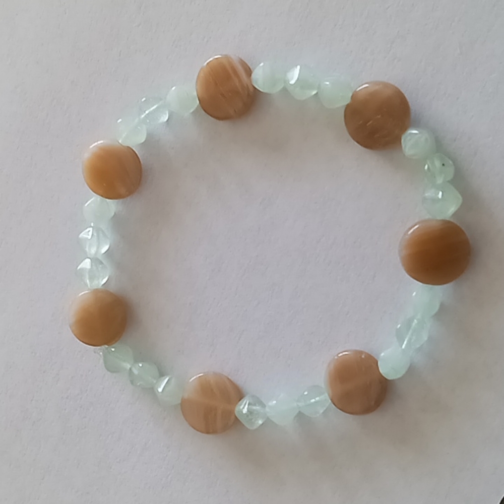 Hand crafted Abalone shell and pastel green blown glass bead statement bracelet